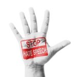 Open hand raised, Stop Hate Speech sign painted, multi purpose c